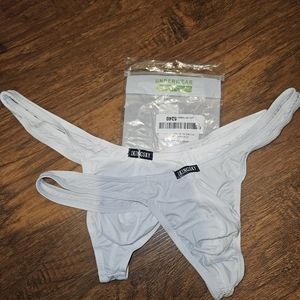 2 new white male pouch thongs